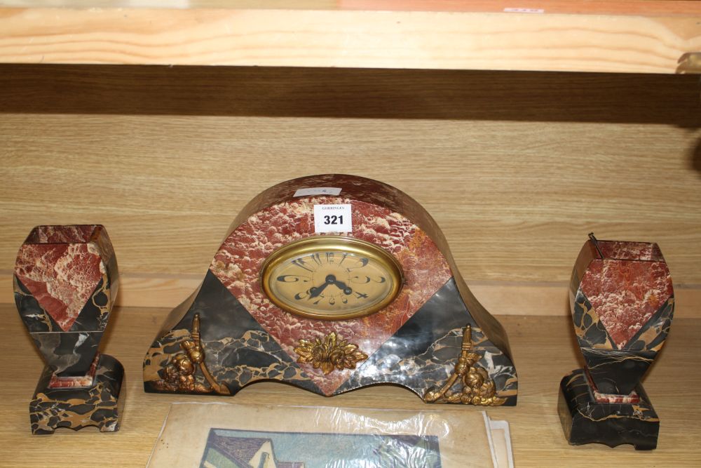 A French rouge marble mantel clock garniture